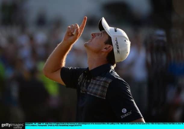 Justin Rose marked his US Open victory by pointing to the sky in tribute to his beloved father, Ken, who passed away in 2002 . Picture: Getty
