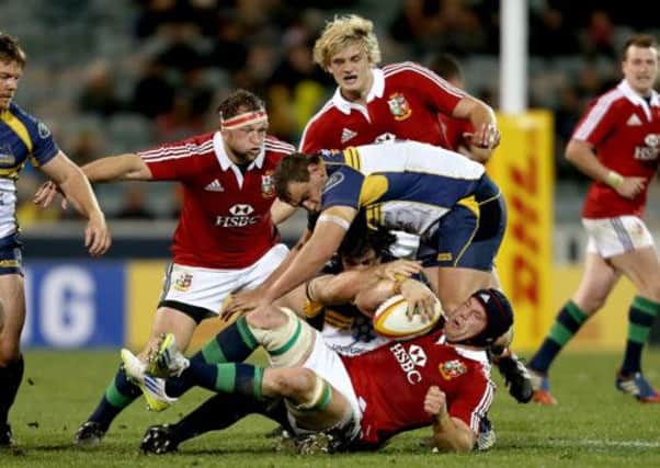 Scotland's Ryan Grant (back left) and Richie Gray (back right) in action for the Lions. Picture: PA