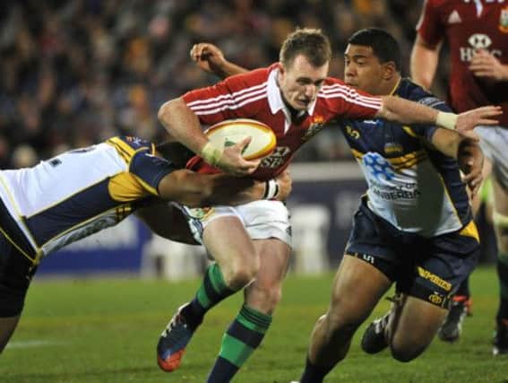 Stuart Hogg of the British and Irish Lions gets caught by Siliva Siliva and Scott Sio. Picture: Getty