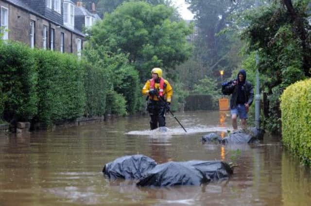 Flooding at Stockbridge Colonies, Edinburgh in July 2012. Picture: Kate Chandler