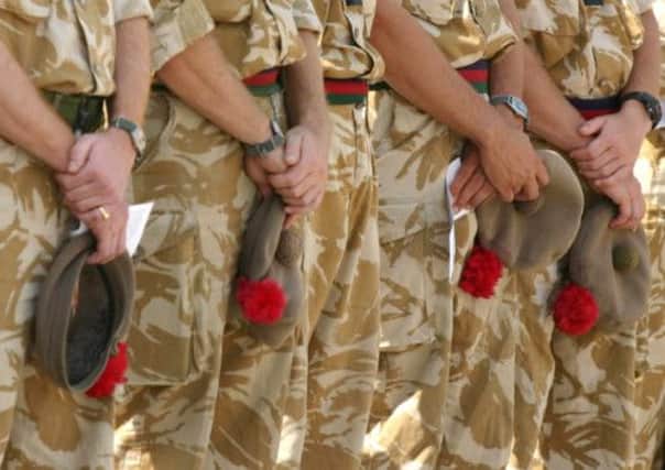 British Army soldiers of 1 Black Watch attend Sunday services in Basra in 2004. Families of soldiers killed in Iraq can now sue. Picture: Getty