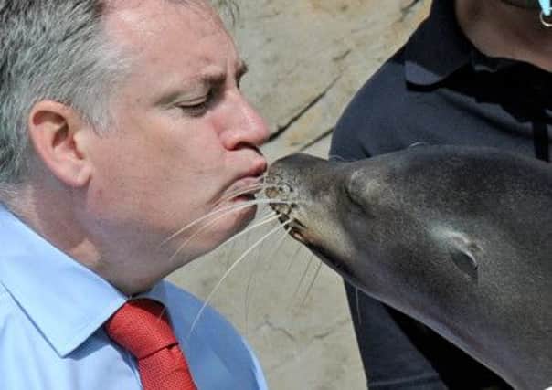 Sealed with a kiss: Richard Lochhead at Blair Drummong Safari Park. Picture: Mike Day