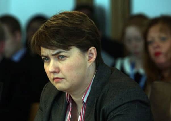 Ruth Davidson listens to the parents at Holyrood yesterday. Picture: PA