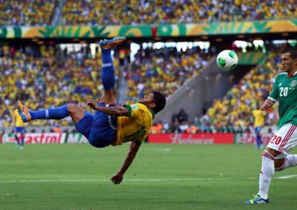 Brazils Hulk attempts an overhead effort at goal during last nights victory over Mexico in the Confederations Cup. Picture: Getty