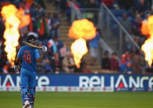 Virat Kohli and his teammates put the heat on Sri Lanka in the Champions Trophy semifinal. Picture: Getty
