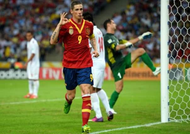 Fernando Torres celebrates the third of his four goals and the sixth of Spain's ten. Picture: Getty