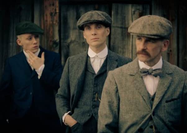 Cillian Murphy as Tommy Shelby, Iddo Goldberg as Freddie and Paul Anderson as Arthur Shelby in Peaky Blinders