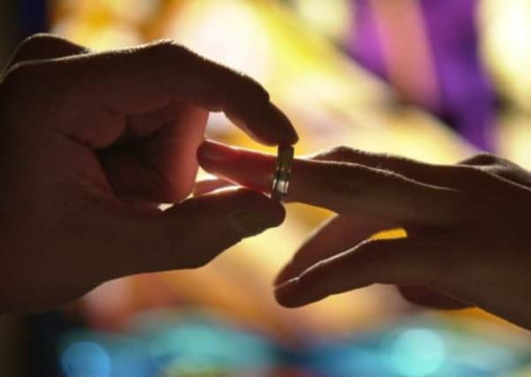 MSPs are to review the possibility of allowing heterosexual couples to enter civil partnerships. Picture: TSPL