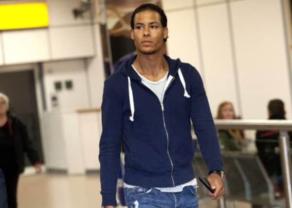 Virgil Van Dijk arrives in Glasgow yesterday. He has signed a four-year deal with Celtic. Picture: SNS