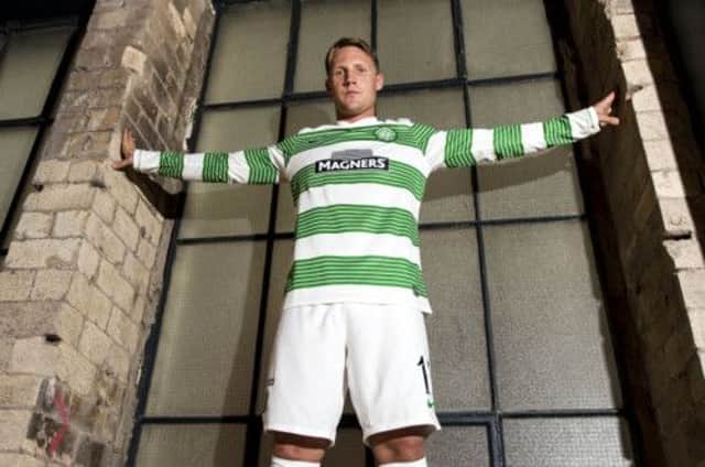 Kris Commons models the new Celtic kit in Glasgow city centre last week. Picture: SNS