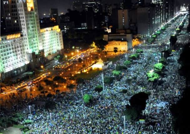 People march in downtown Rio de Janeiro. Picture: Getty