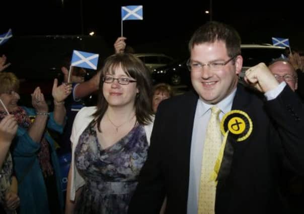 Newly elected MSP Mark McDonald with his wife Louise. Picture: PA