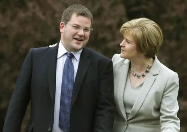 Newly elected MSP for Aberdeen Donside Mark McDonald and Deputy First Minister Nicola Sturgeon celebrate an SNP victory. Picture: PA
