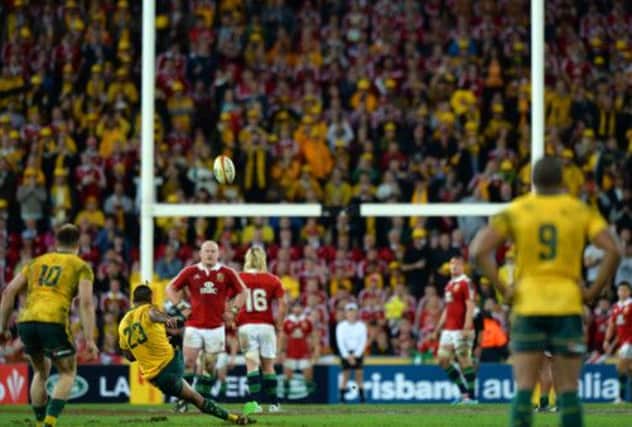 Australia's Kurtley Beale slips and misses the final kick. Picture: Getty