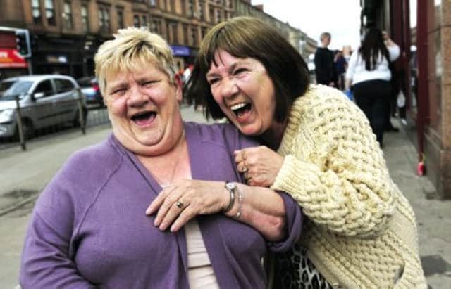 Peggy Kelly and Sandra Glen present the smiling face of Glasgow. Picture: Robert Perry