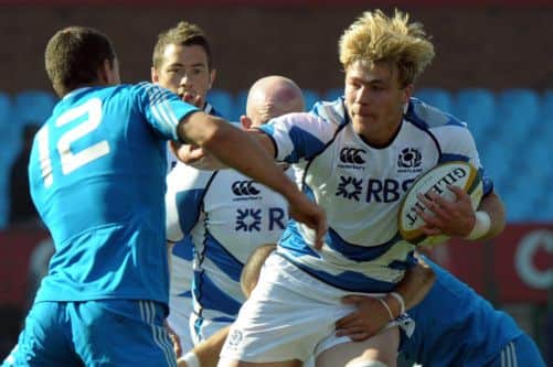 David Denton storms the Italian defences. Picture: Getty