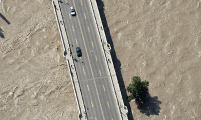 The city suffered extensive floods, which forced the evacuation of its downtown district. Picture: AP