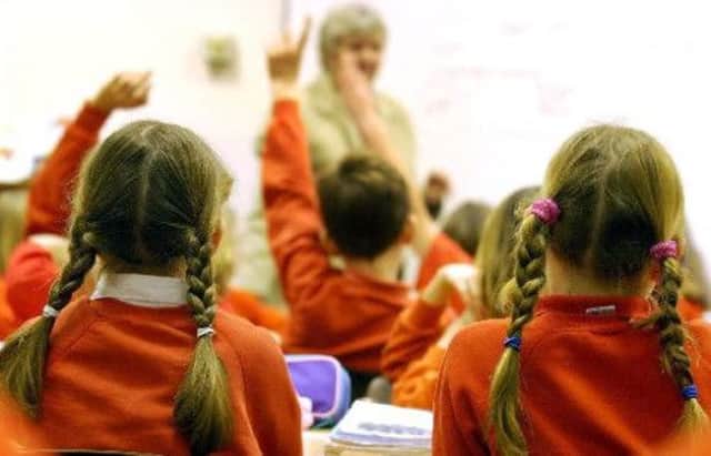 The Scottish Government has a target of doubling the number of pupils gaining qualifications in Chinese language from the 2011-12 level by 2017. Picture: PA