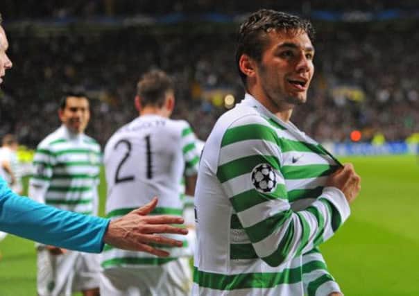 Tony Watt celebrates after scoring against Barcelona in last year's Champions League. Picture: SNS