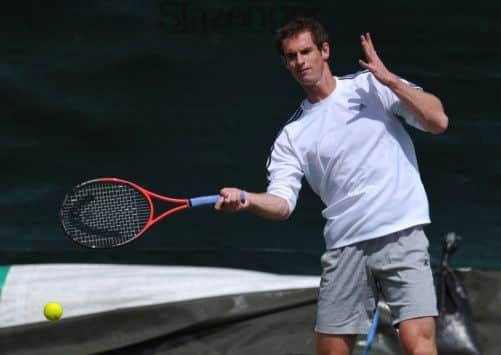 Andy Murray plays a forehand during a practice session at the All England Club ahead of his Wimbledon firstround match. Picture: Getty