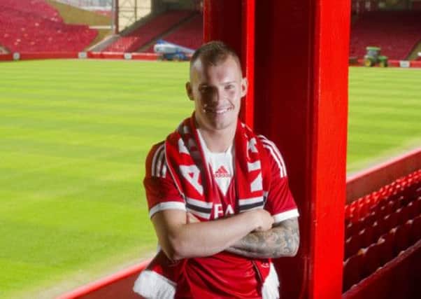 Gregg Wylde signs for Aberdeen. Picture: SNS