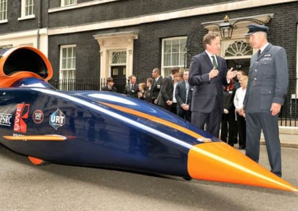 David Cameron and RAF pilot Andy Green with the Bloodhound Jet Car. Picture: Getty