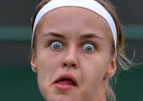 Slovakia's Anna Schmiedlova eyes the ball for a return. Picture: Getty
