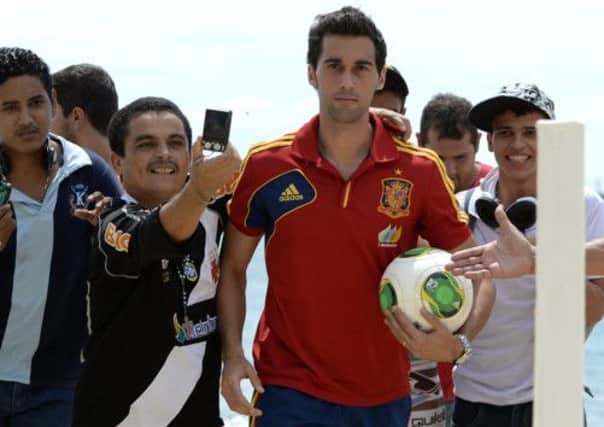 Spain's Alvaro Arbeloa surrounded by Brazilian fans. Picture: Getty