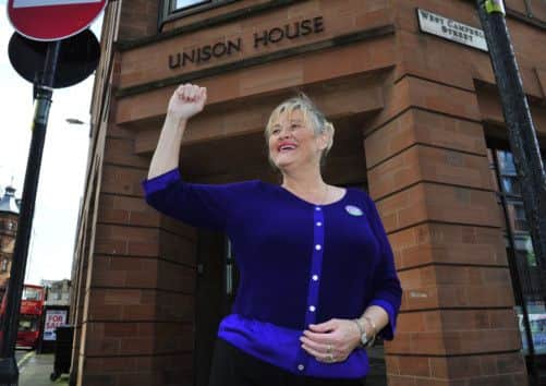 Elaine North is delighted to have won their equal pay court case. Outside Unison HQ in Glasgow.  Picture Robert Perry The Scotsman 26th June 2013