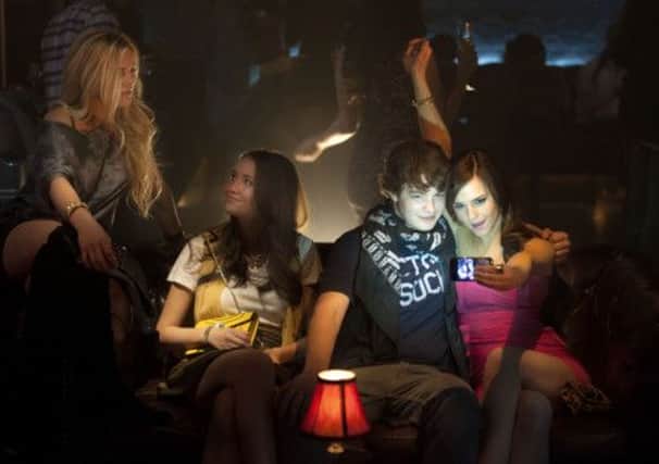 Emma Watson, right, in The Bling Ring
