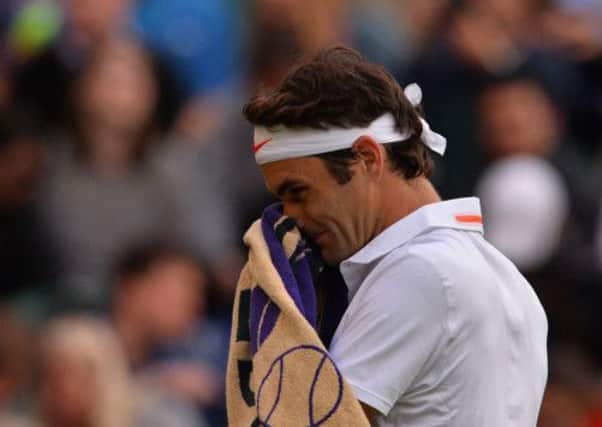 Roger Federer has crashed out of Wimbledon after losing to Ukranian  Sergiy Stakhovsky. Picture: Getty