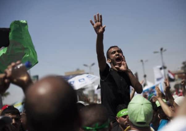 An Egyptian man chants pro-Morsi slogans during a rally in Cairo. Picture: AP
