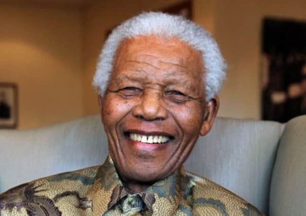 File photo of former South African president Nelson Mandela, who has a square named after him in Glasgow. Picture: Getty