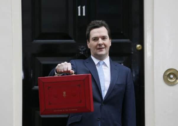 George Osborne's axe could miss Scots civil servants. Picture: Reuters