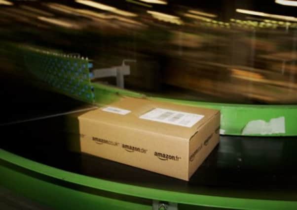 Amazon have announced that CDs or vinyl purchased by customers will come with free mp3s versions. Picture: Getty