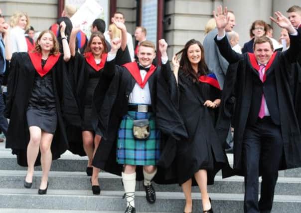 Edinburgh Napier graduates celebrate at the Usher Hall. New figures show that Scottish graduates earn more than their counterparts in the rest of the UK. Picture: Ian Rutherford