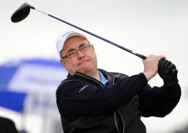 Alex Salmond at the 2012 Scottish Open pro-am. He will not attend The Open over Muirfield's membership policy. Picture: Jane Barlow