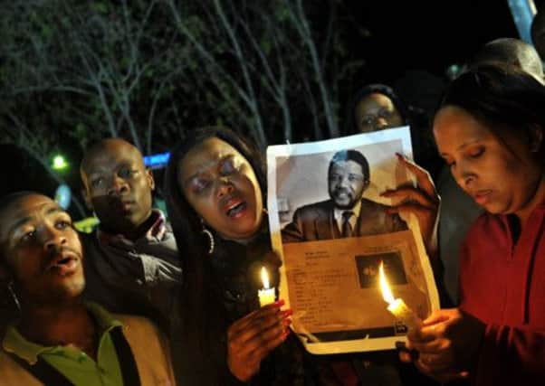 Some supporters have held a candle-lit vigil for Nelson Mandela. Picture: Getty
