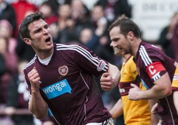 John Sutton, seen celebrating a goal against Motherwell, has rejoined his former club. Picture: Ian Georgeson