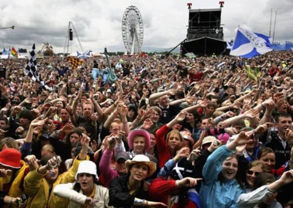 Revellers enjoy the atmosphere at T In The Park. Picture: Getty