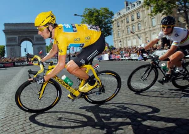 British riders Bradley Wiggins and Mark Cavendish on the final stage of last year's Tour. Picture: Getty