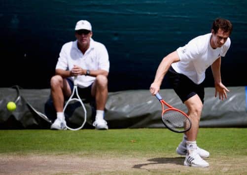 Andy Murrays coach Ivan Lendl watches intently as the Scot puts in some practice ahead of todays last-16 clash. Picture: Getty