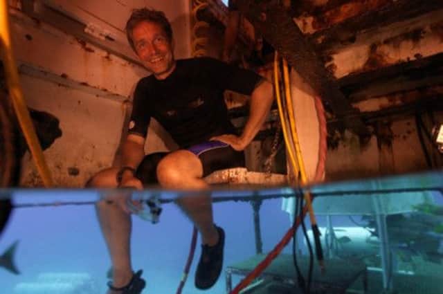 Fabien Cousteau in the Aquarius undersea lab and habitat, where he aims to spend 31 days. Picture: Reuters
