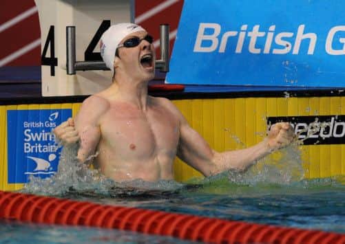 Ross Murdoch celebrates winning the Mens Open 100m Breastroke Final. Picture: PA