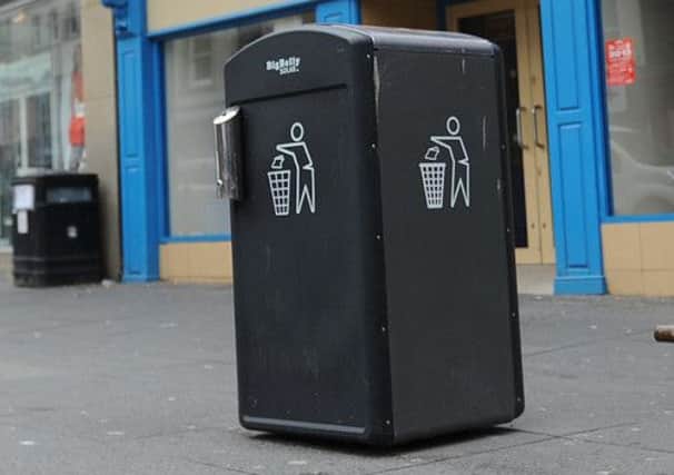 The solar powered bins are fitted with waste compactors. Picture: Johnston Press