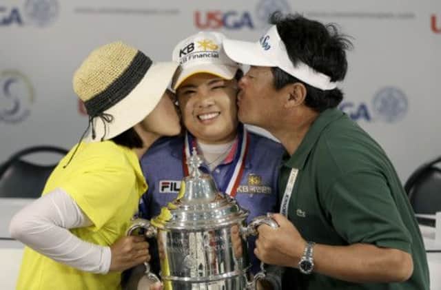 Imbee Park was congratulated by her parents after winning the  US Womens Open. Picture: AP