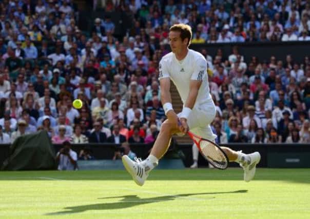 Andy Murray runs onto a backhand during a match that was by no means straightforward. Picture: Getty