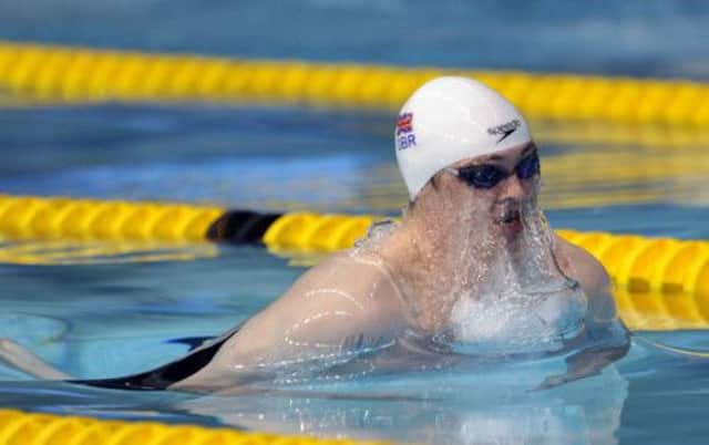 Ross Murdoch powers his way to a Scottish 100m breaststroke record in Sheffield. Picture: PA