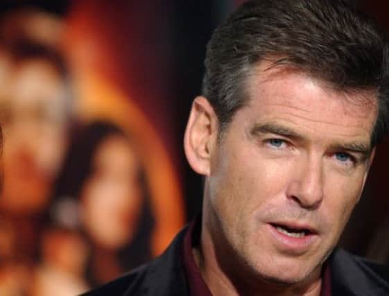 Pierce Brosnan is reported to have flown back to the UK to be with Charlotte. Picture: AP