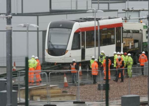 A tram is taken into the city's depot at Gogarburn. Picture: Toby Williams